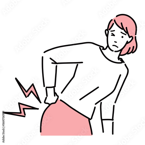 腰痛で腰を押さえている若い女性