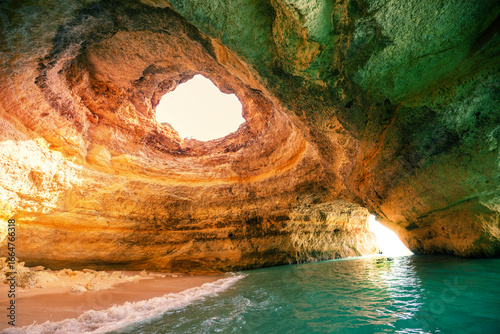 Coastal rocky seascape. View of Benagil cave in the Algarve region of the Atlantic Ocean, Portugal, Europe