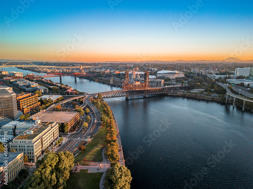 Drone Aerial View of Portland Oregon Waterfront and Steel Bridge at Sunrise