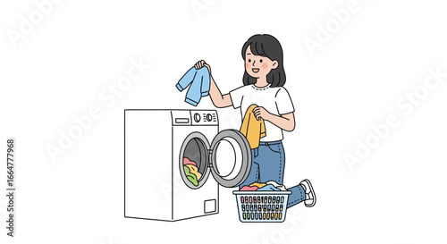 Woman cheerfully doing laundry at home with modern machine