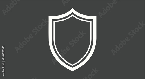 Elegant white outline shield emblem against a muted dark gray backdrop evoking concepts of security, protection, and trustworthy representation