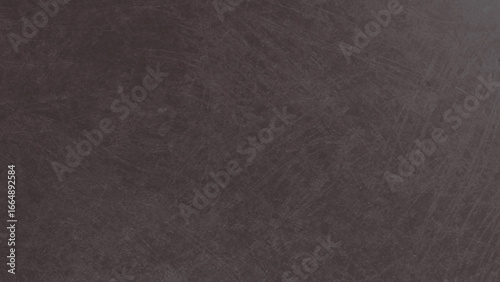A deep brown textured background, showcasing subtle scratches and variations in tone, providing a rustic and natural aesthetic