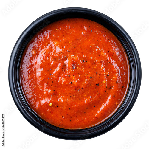 Mexican Salsa Roja Sauce in Black Ceramic Bowl Isolated