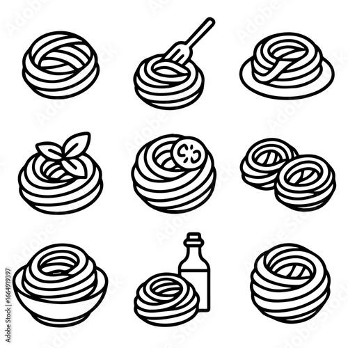 Black outline pasta nests with basil fork olive oil and sliced zucchini.