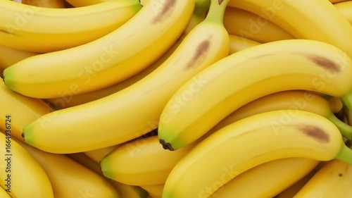 Delicious yellow bananas rotating, a healthy and vibrant fruit snack bursts with tropical flavor