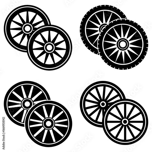 Four black and white wheels arranged in pairs with different spoke and tire designs on a white background
