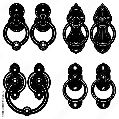 Collection of four pairs of decorative black metal door knockers with ring handles and ornate backplates