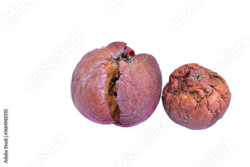 Two rotten apples lie on a PNG background.
