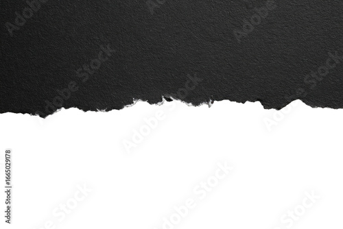 Dark gray textured surface with torn paper edge