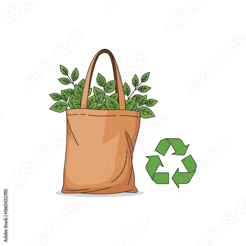 A tan tote bag filled with green leaves sits next to a green recycling symbol, representing eco-friendly practices.