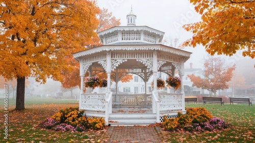 Autumn gazebo in a misty park