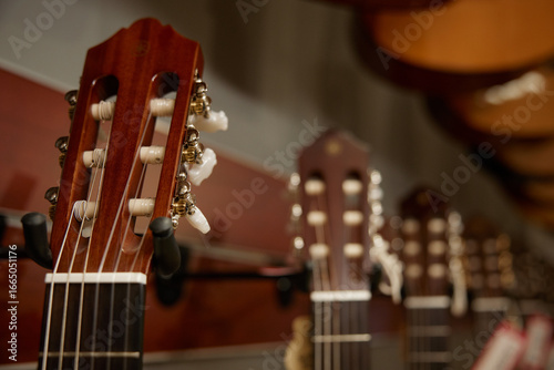 Photos Detailed closeup of the headstock of an acoustic guitar