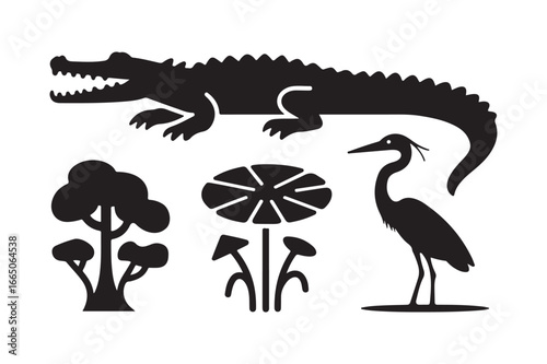 Silhouette of alligator heron and swamp plants