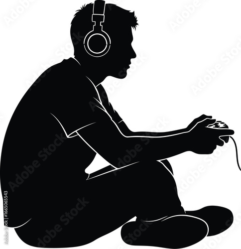 Silhouette of a gamer with headphones sitting crosslegged and playing video game with a controller for graphic design element