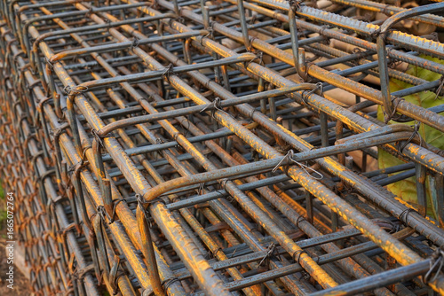 Close up of steel reinforcement bars stacked for building construction material