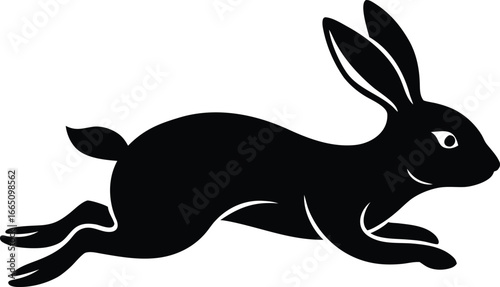 Black silhouette of a rabbit in mid leap