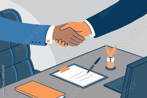 Business handshake sealing a deal over desk with contract.