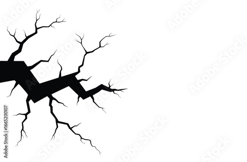 Dramatic black crack on white background for striking design elements or disaster visuals for creative projects