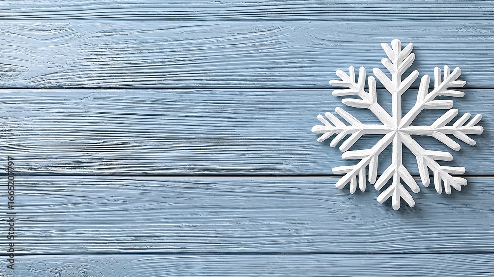 Fototapeta premium White Snowflake on Blue Weathered Wood Winter Holiday Background
