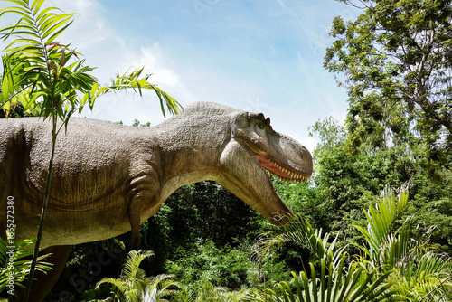 Wallpaper Mural Pattaya​ Dinosaur Kingdom- 8th June 2025: A large dinosaur statue,life-size Tyrannosaurus Rex (T-Rex) model at Chonburi Province,Thailand. Torontodigital.ca