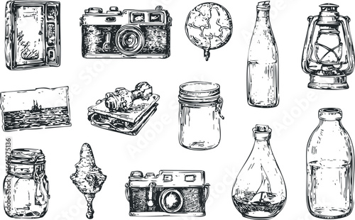 Collection of vintage items including cameras, glass bottles, jars, and a lantern