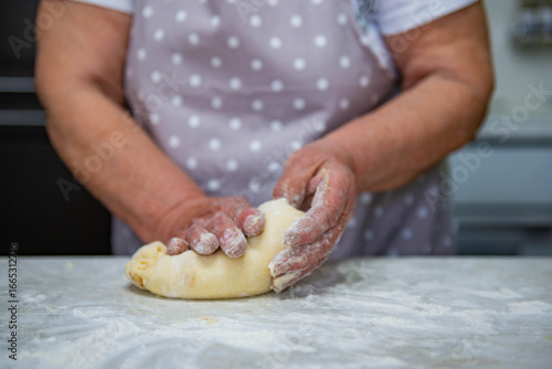 For pies, the dough is kneaded on the table by grandmother