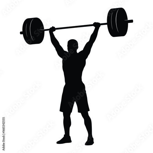 Muscular athlete silhouette lifting heavy barbell overhead in strength training and fitness concept silhouette