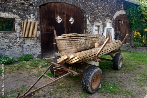 Oak Wood as Wooden Floorboards from the Sawmill on an old Transport Wagon