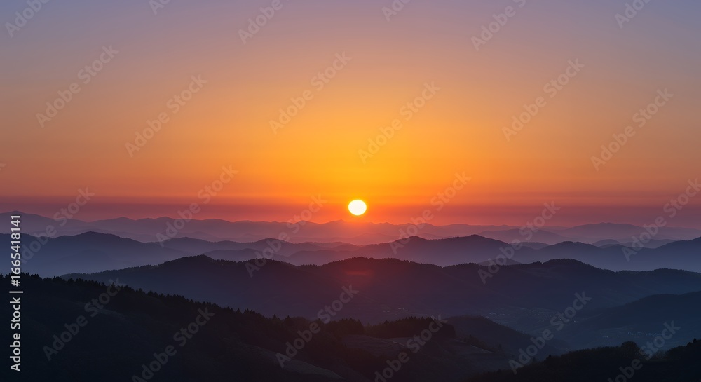 Obraz premium Majestic Sunset Over a Layered Mountain Landscape with a Golden Sky.