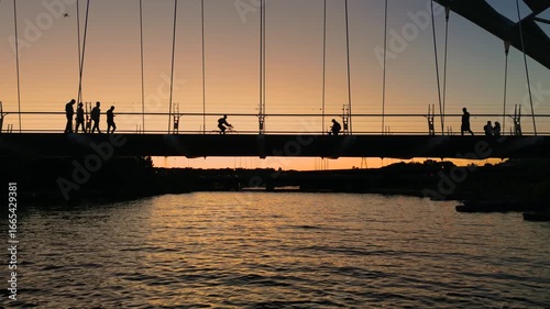Lots of activity on the Humber River bridge on a warm summer night