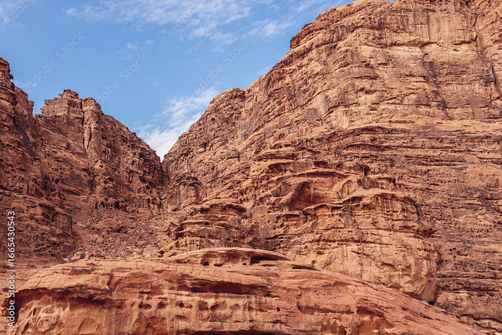 Fototapeta premium Rocks above Lawrence Haouse in Wadi Rum also known as Valley of light or Valley of sand in Jordan