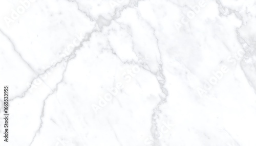 A close-up view of a smooth, white marble surface, showcasing intricate veining patterns and a subtle gray tone.
