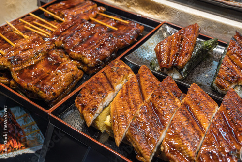 Billede på lærred Osaka, Japan, unagi eel grilled product at Kuromon market