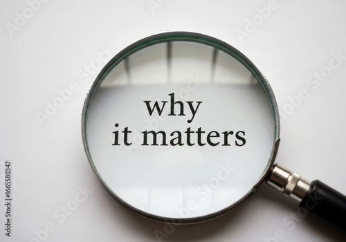 A magnifying glass focuses on the words why it matters, symbolizing inquiry and the search for meaning