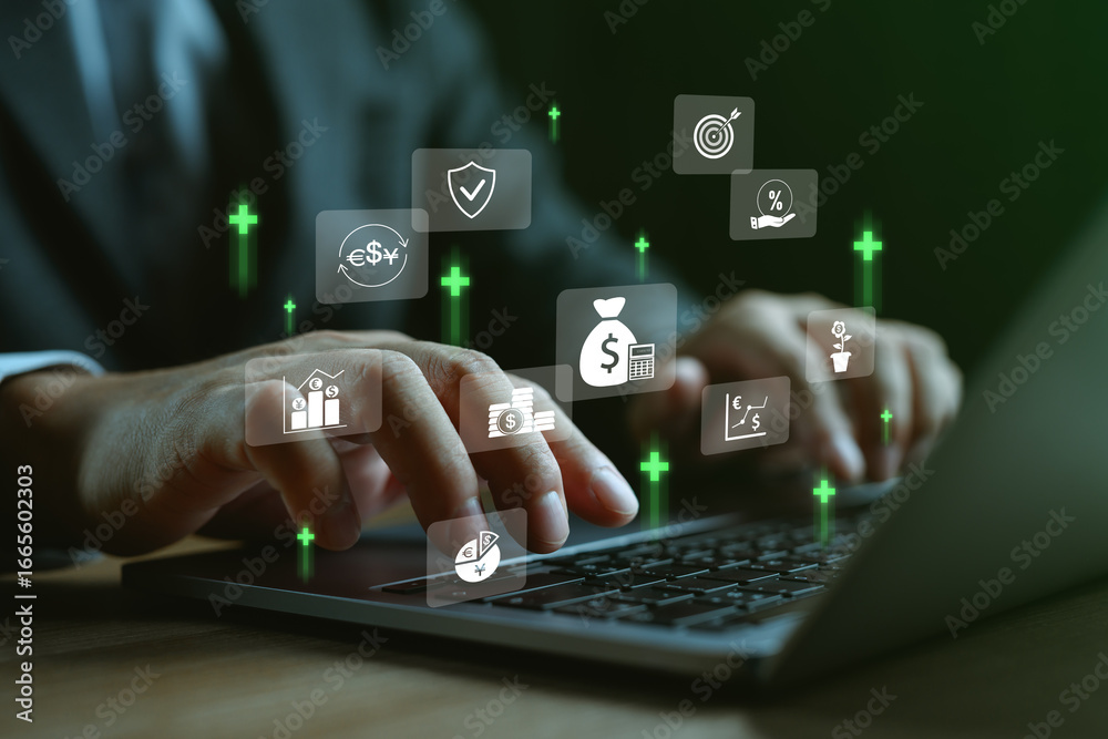 Naklejka premium Hands typing on laptop with financial icons, showing investment growth, currency exchange, fintech technology, savings management, interest rate and secure digital banking strategy concept.