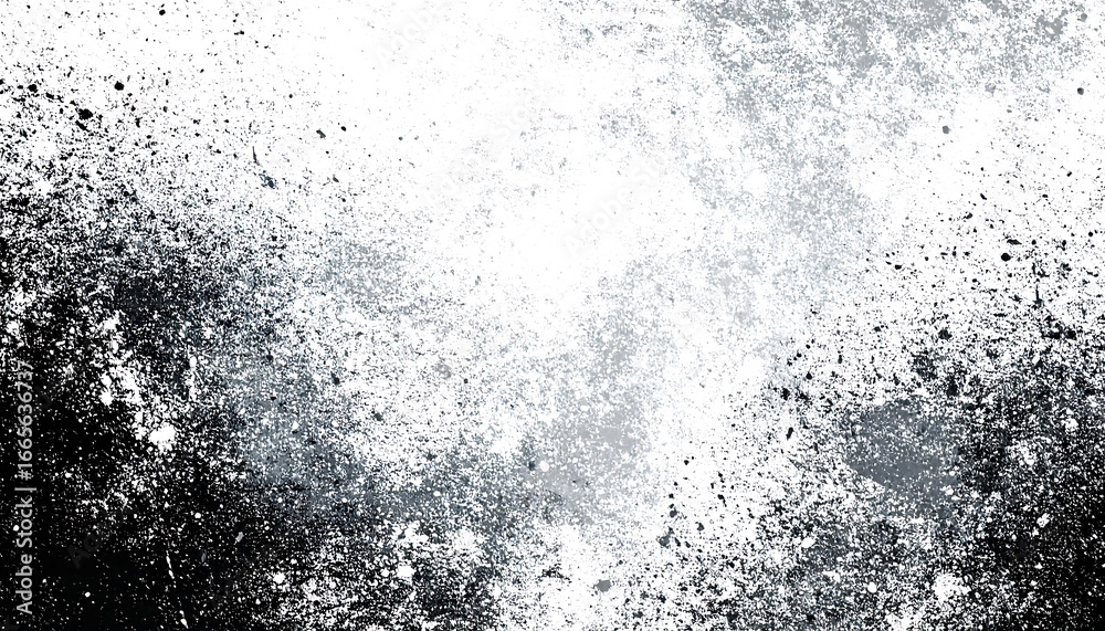 Obraz premium A textured monochrome surface with speckled and sprayed paint effects displays a gradient of dark to light shades.