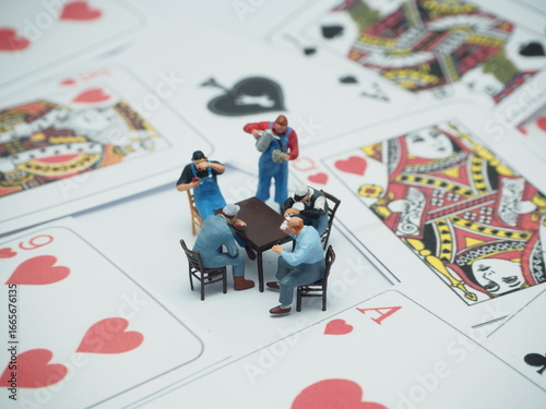 Foto Mini toy of action figure at table with blurred background