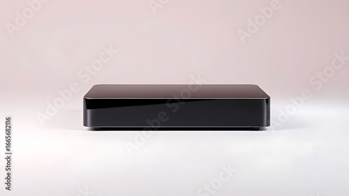 Wallpaper Mural Sleek rectangular device with glossy finish on a gradient backdrop, exemplifying minimalist technological aesthetics. Torontodigital.ca