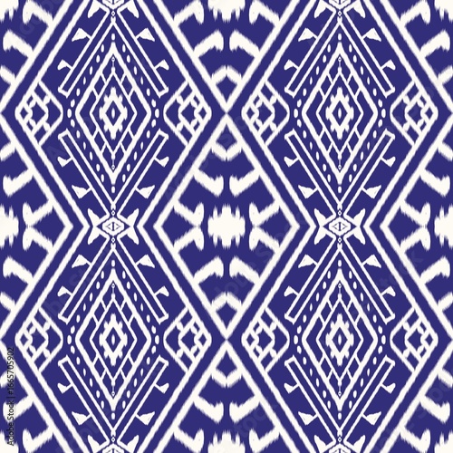 Illustration of white, blue abstract geometric Ikat pattern seamless.