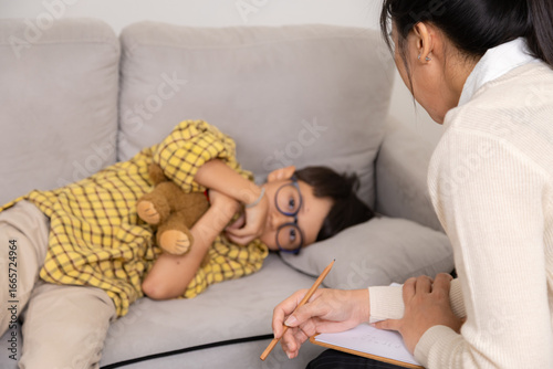 Принти на полотні Therapy, child, counseling, psychologist, emotion reflected in withdrawn posture