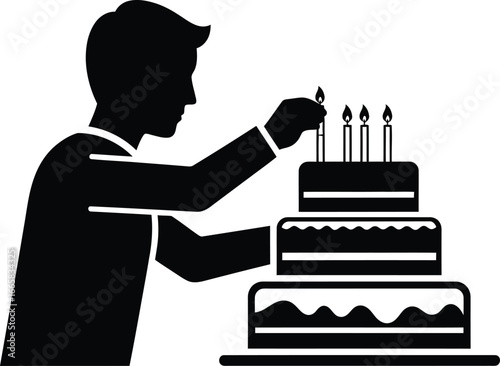 Silhouette of a man lighting candles on a birthday cake