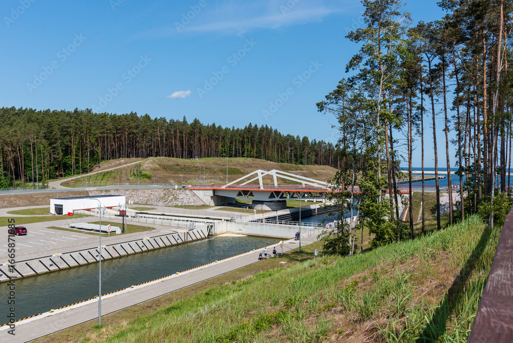 Fototapeta premium Sztutowo - Vistula Spit Canal, Poland - A modern engineering project connecting the Vistula Lagoon with the Baltic Sea. The Vistula Spit Canal is an impressive attraction.