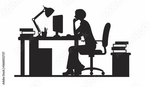 Silhouette of a person sitting at a desk with a computer lamp and books in a workspace setting shown