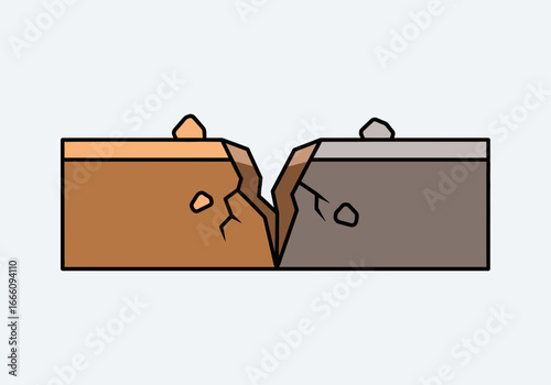 Two sections of earth cracked apart with small rocks and dirt.