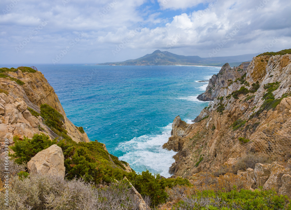 Fototapeta premium Sardegna, Italy - The worderful south coast of Sardinia region, in the area of Sulcis, province of Cagliari. Here in particular the Buggerru beach named Cala Domestica