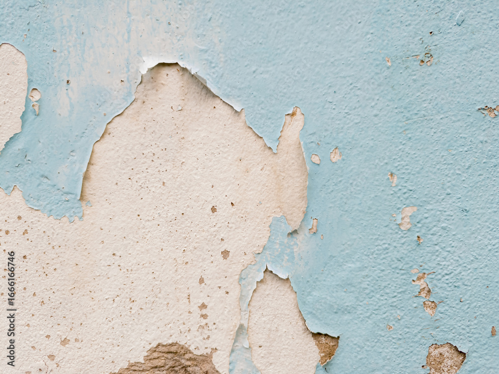 Αυτοκόλλητο Close-up light blue painted wall with large, peeling sections revealing gray, rough concrete underneath