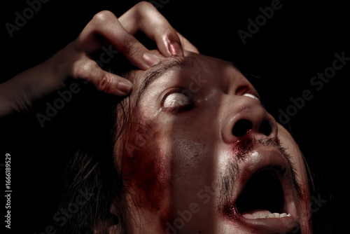 Wallpaper Mural Dramatic Expression of Man Screaming in Dark Light Torontodigital.ca