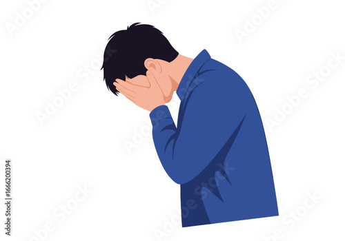 Man in blue shirt covers face with hands experiencing strong emotional distress and sadness