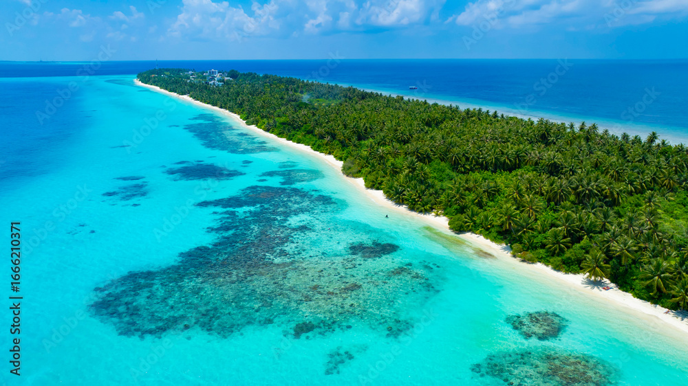 Obraz premium The aerial view in the island with white sand beach as coastline in summer Maldives