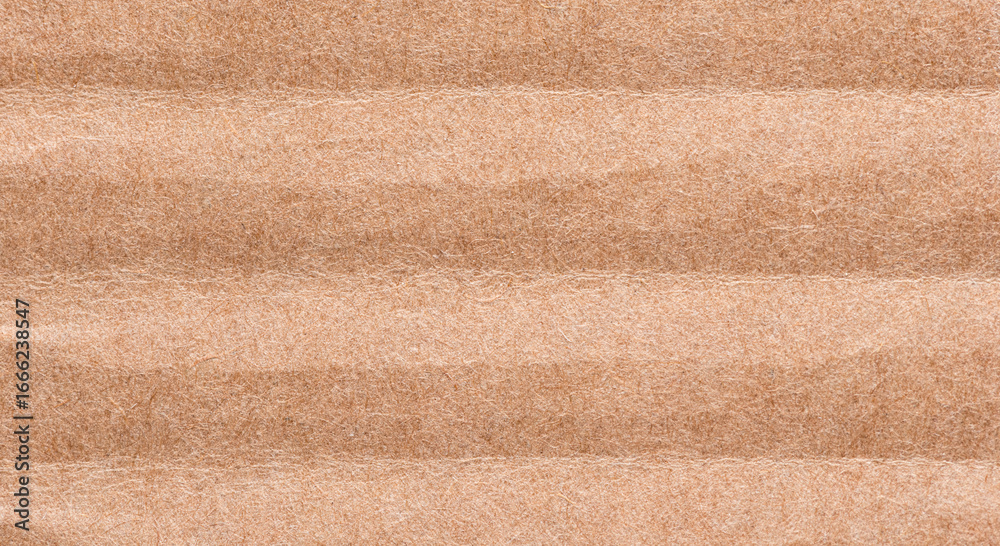 Fototapeta premium Corrugated cardboard, brown textured paper background